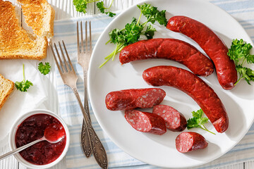 Smoked isterband sausages on a plate