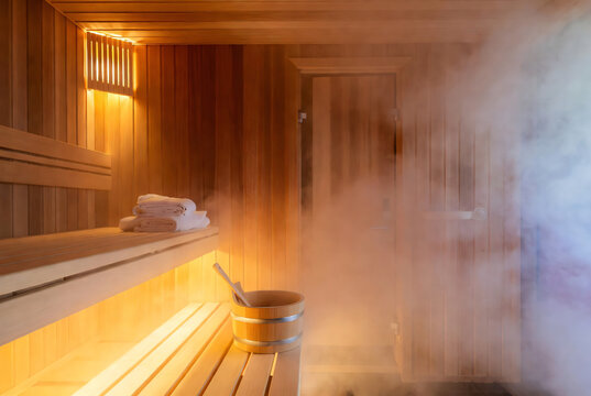 Modern Finnish Sauna Interior with Warm Wooden Design and Relaxing Wellness Atmosphere