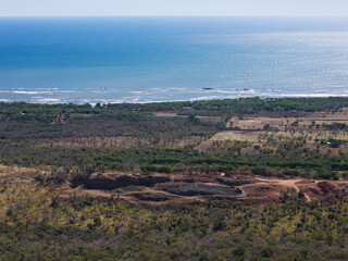 Naklejka premium Sand quarry next to ocean beach