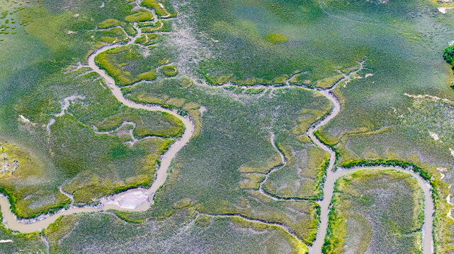 Aerial view of Charleston, South Carolina landscapes showcasing lowcountry marshes and winding river waterways on Kiawah Island