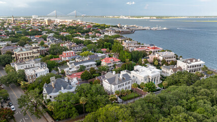 Panoramic Aerial view of Charleston, South Carolina cityscape skyline showing lowcountry landscapes and south of broad neighborhood with historic homes and mansions along waterfront © Josh-Lehew