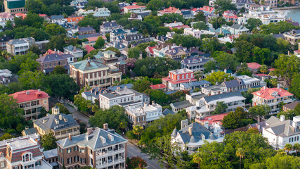 Naklejka premium Aerial view of Charleston, South Carolina cityscape skyline showing lowcountry landscapes and south of broad neighborhood with historic homes and mansions