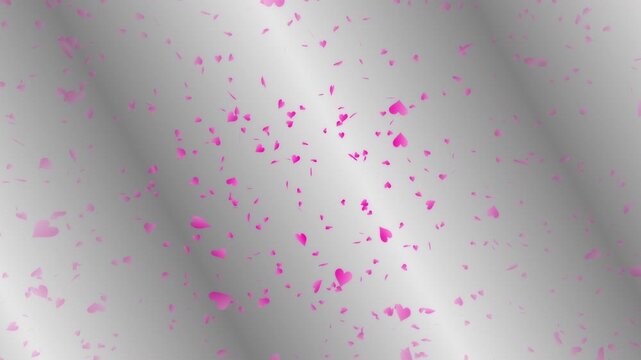 Pink heart shapes being lit up and falling down on silver gradient moving background. Abstract background for Happy Valentine's day and wedding ceremony.