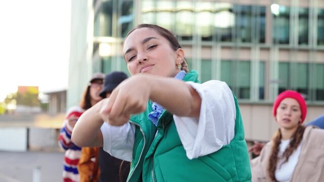 Engaging dancer showcasing skill and enthusiasm while performing captivating movements with fellow performers.