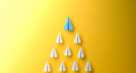 Leadership concept, blue leader plane leading white planes, on yellow background. 3D Rendering © Vlad Chorniy