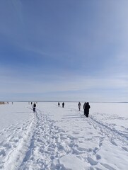 frozen snow-covered large winter lake
