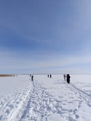 frozen snow-covered large lake