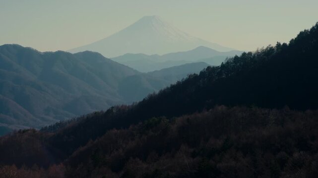 Destination travel scene showing Mount Fuji through hills of Yamanashi.