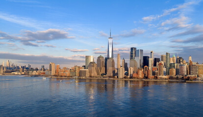 Obraz premium New York City skyline over Hudson River. Manhattan waterfront panorama with modern skyscrapers in New York City, NYC. New York skyline panorama. Manhattan skyline in New York City.