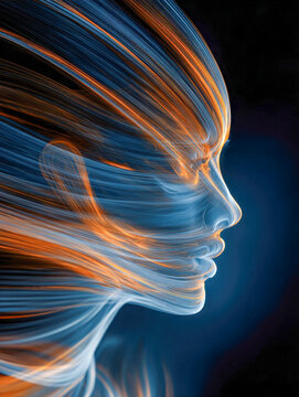 Profile of a human face composed of flowing blue and orange luminous lines against a dark background, symbolizing energy and futuristic technology concepts