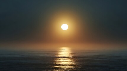 A luminous sun hovers over a misty ocean horizon casting a golden reflection on calm waves at sunrise or sunset