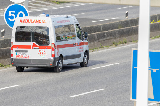 Ambulance driving on highway providing emergency medical transport