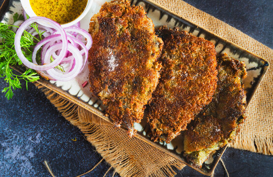 Lote Fish Fry with Mustard and Onion Slices | Crispy Bombay Duck Fry | Golden Fried Fish Snack | Traditional Indian Seafood Street Food