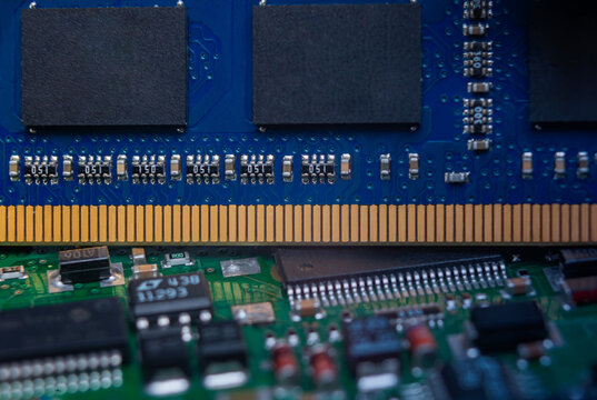 Memory module with DRAM chips shown in detail, highlighting shortage in SODIMM and DIMM supplies during production phase