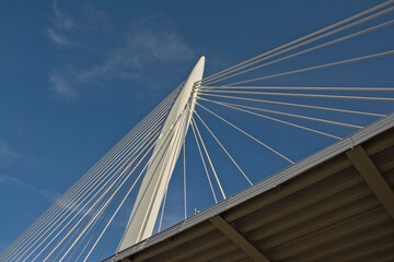 Fototapeta premium Architecture detail of Prins Clausbrug,cable-stayed bridge , low angle view on a cloudy sky. Utrecht,The Netherlands 