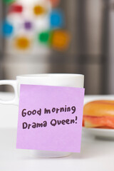 a coffee mug with a handwritten morning note