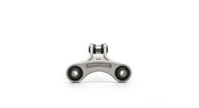 Curved automotive suspension control arm with rubber isolators and metal frame, isolated studio shot.