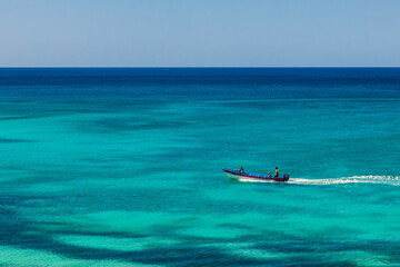 Tour Boat Sailing in Turquoise Waters of Bahia de las Aguilas Dominican Republic