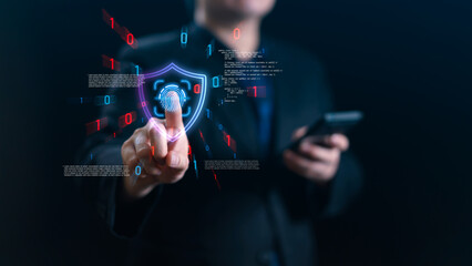 Businessman touching virtual fingerprint scanner with shield icon and binary code. Concept of...