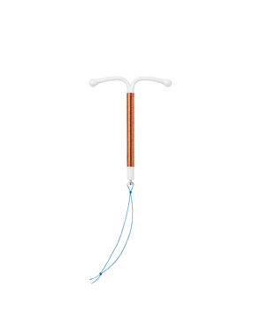 Copper IUD Intrauterine Contraceptive Device Isolated on Black Background