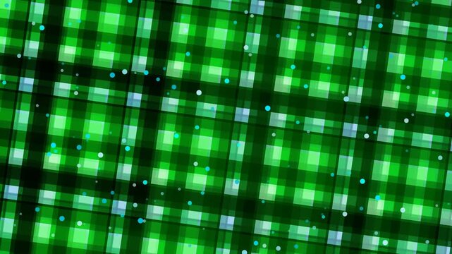 Close-up of a vibrant green and black plaid pattern with small white dots