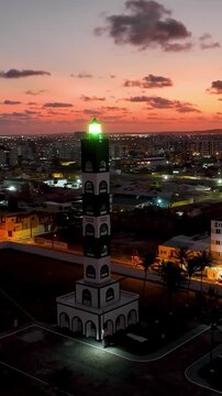 Lighthouse At Aracaju Sergipe Brazil. Aerial View Of A Bustling Ligthhouse In A Coast City. Sunset Sky Downtown Cityscape. Sunset Outdoor Downtown Panning Wide. Aracaju Sergipe.