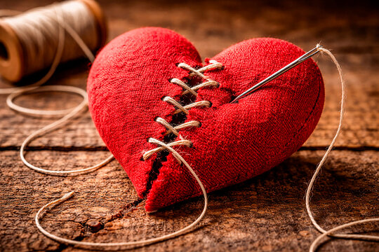 Mending a broken heart with stitches of thread, healing wounds