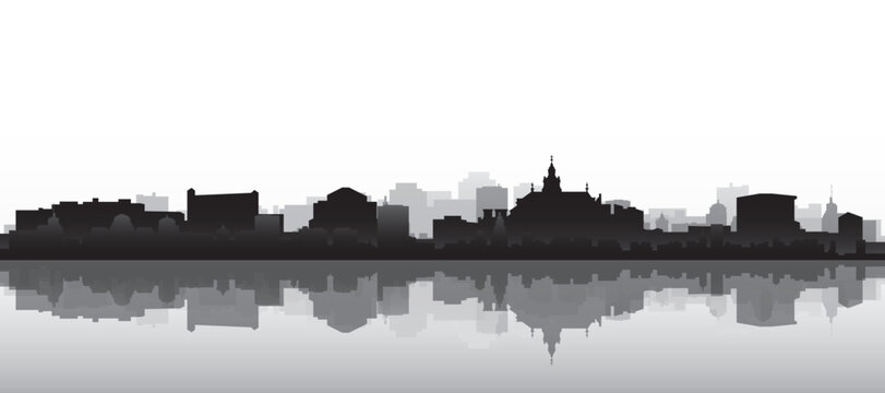 Black and white panoramic poster of the city skyline with misty background buildings and water reflection of KRAKOW, POLAND