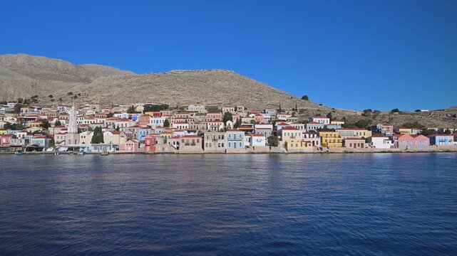 Wide View of Chalki Town, Hills, and Sea, Greece