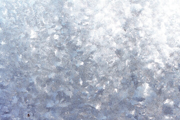 Obraz premium Beautiful winter background with frosty pattern on glass