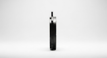 Side view of a sleek, modern car brake disc with metallic finish, isolated on a clean white background.