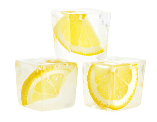Frozen lemon slices inside clear ice cubes cooling beverage