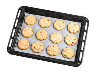 Chocolate chip cookies baking on parchment paper lined tray