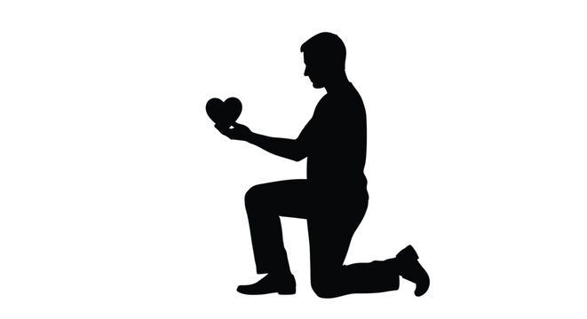 A man proposing with a heart captured in a striking silhouette