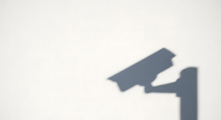 Fototapeta premium Silent watch Security camera shadow on wall
