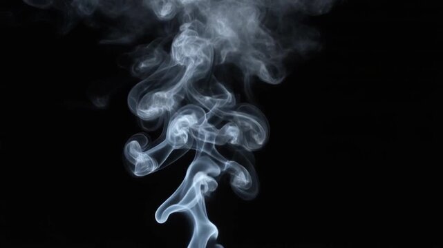 Smoke rises slowly against a dark background, creating a mystical atmosphere