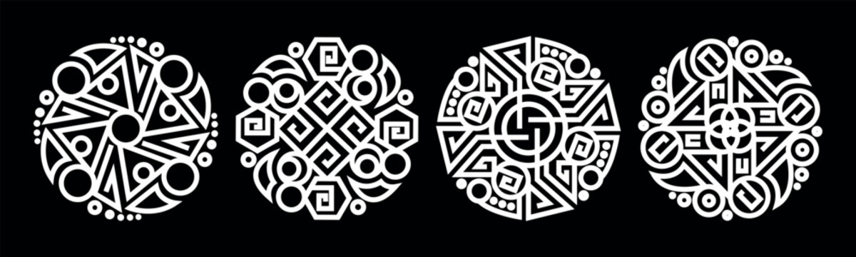 Collection of four geometric tribal emblems and mystical circular symbols 