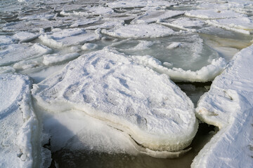 Thick Ice Floes Covering the Baltic Sea Coast in Winter © Zigmunds