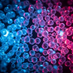 Numerous tiny translucent spheres glow with vibrant blue and pink light, suggesting cellular structures or microscopic particles.