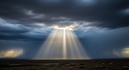 Dramatic Sky and Sunlight Beams Shining Through Clouds Over Landscape.
