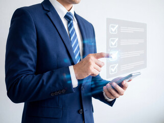 A professional in a tailored suit interacts with a digital checklist, symbolizing task completion, precision, and efficiency in a modern business setting.