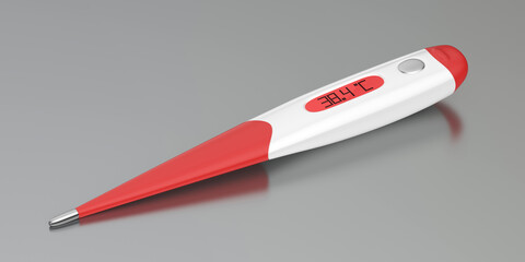 Digital medical body thermometer on silver metal desk