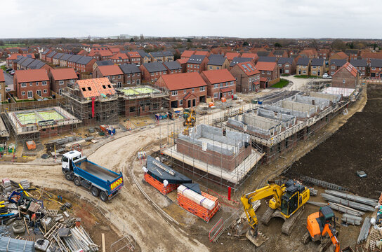 Aerial view directly above a new build housing construction site in the UK