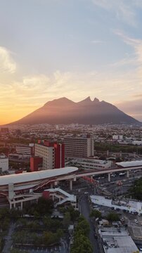 Cerro de la Silla at Sunrise &ndash; Aerial Push Forward Over Monterrey City Skyline, Mexico