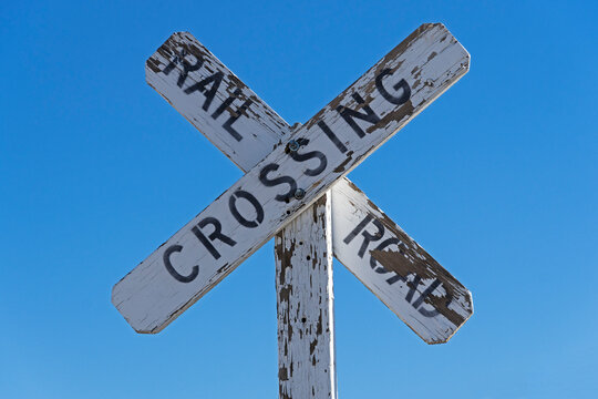 Old Wooden Railroad Crossing Sign