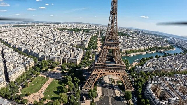 Aerial view of Eiffel Tower and Paris cityscape on a sunny day
