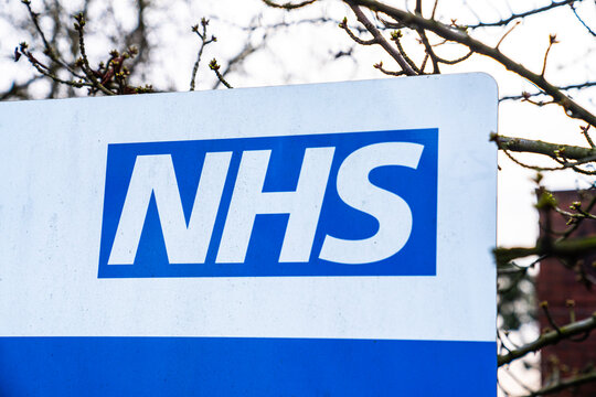 NHS GP Surgery Sign, British National Health Service Logo, England, United Kingdom, Britain, February 2026