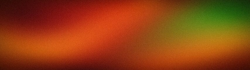 Fototapeta premium A wide, abstract grainy background with a warm blurred gradient of orange, copper, and dark green tones, featuring a sandy texture for atmospheric web design