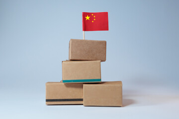 boxes with Chinese goods and products stacked on top of each other