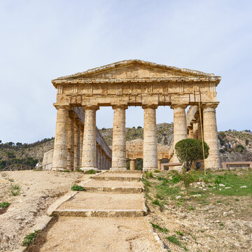 Iconic Frontal View of the Doric Temple of Segesta, Emphasizing its Hexastyle Facade and Classical Symmetry